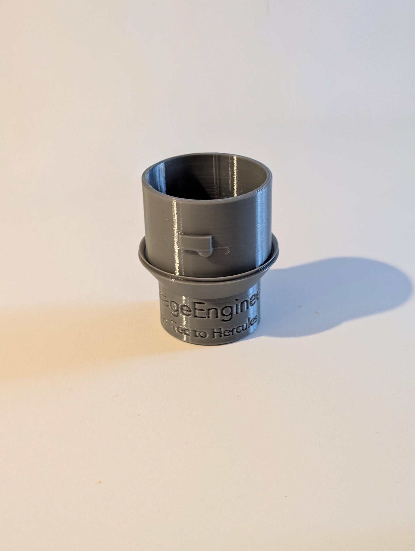 Adapter for Hercules 12 Gallon OSHA-Compliant HEPA Dust Extractor to use a standard 1.25" spiral threaded hose.